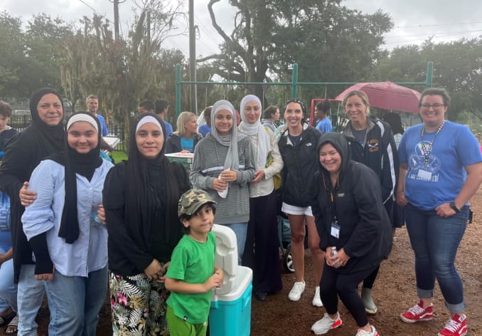 Pizza party at the park with students image