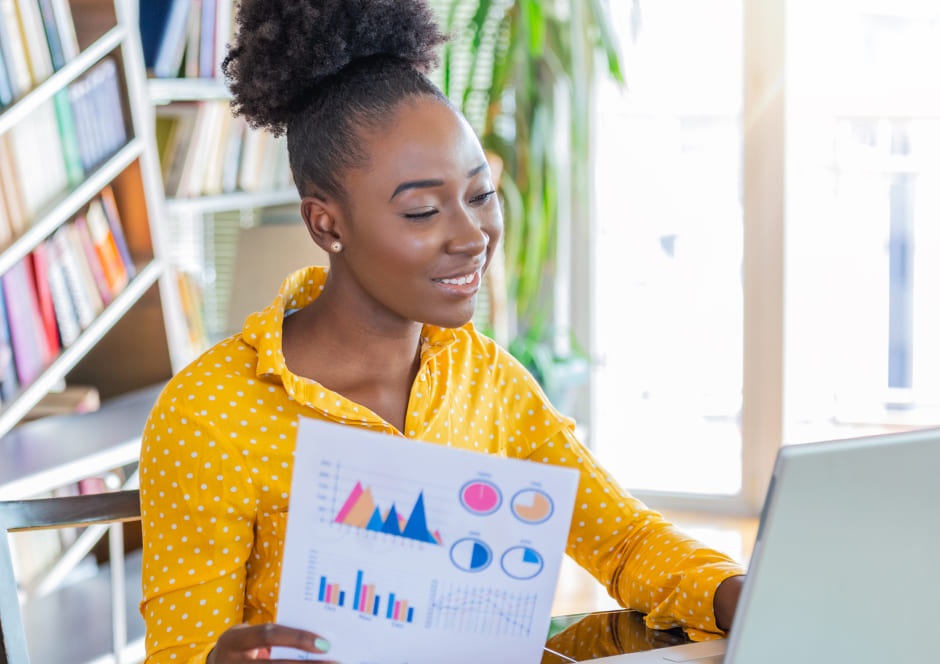 woman working with computer and paper graphics
